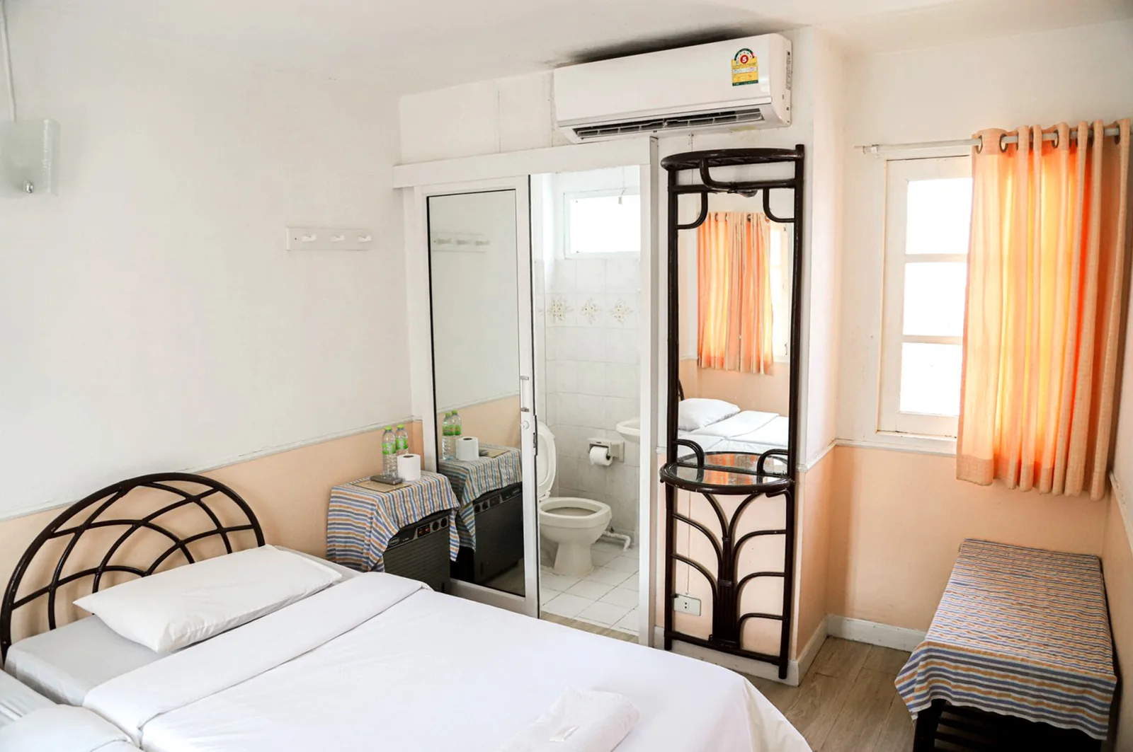 Standard room with en-suite bathroom and bright window
